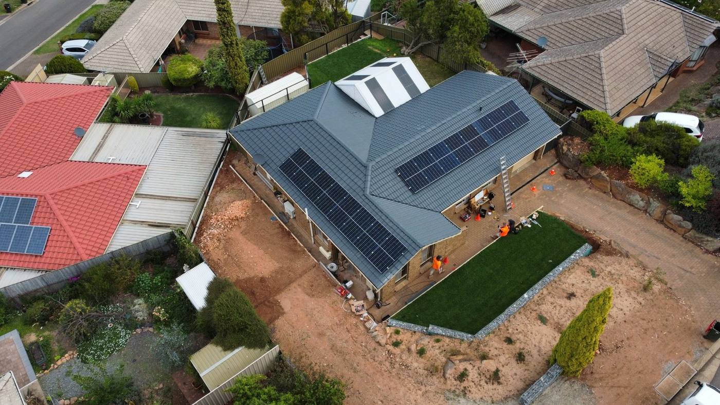 NG Elec crew finishing a solar install, seen from above