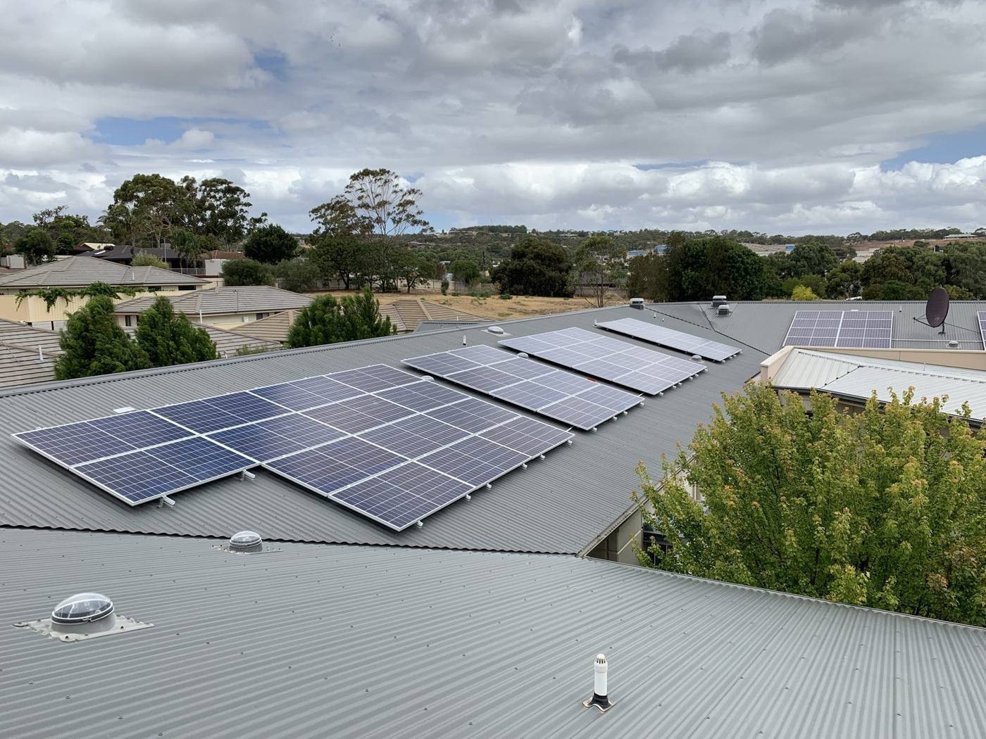 Large solar array across a commercial building roof